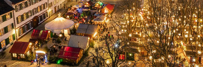 Der Basler Weihnachtsmarkt auf dem Münsterplatz gilt als einer der schönsten und traditionsreichsten der Schweiz.