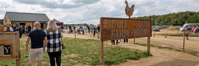 Customers queue at Jeremy Clarkson's Diddly Squat farm shop in the UK.