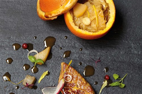 Gastronomic art at Cour des Loges: duck, foie gras, vegetables and orange.