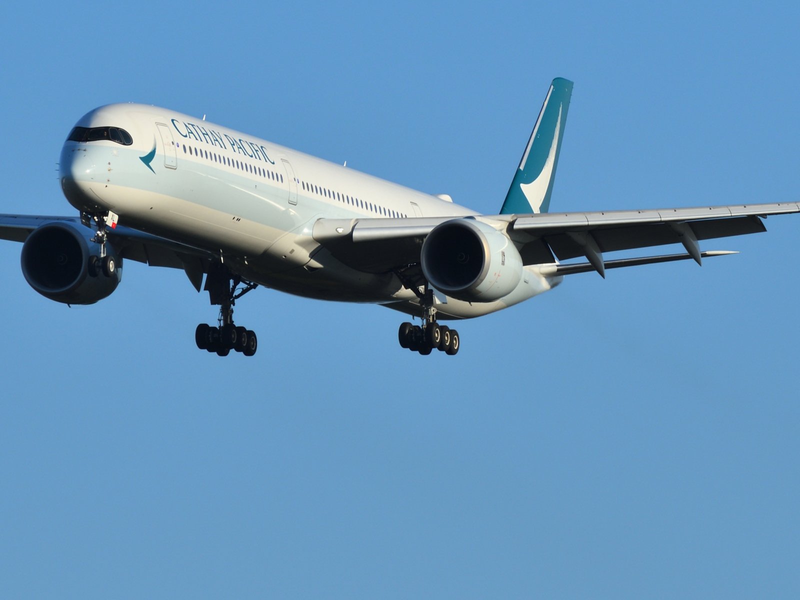 A Cathay Pacific flight prepares to land.
