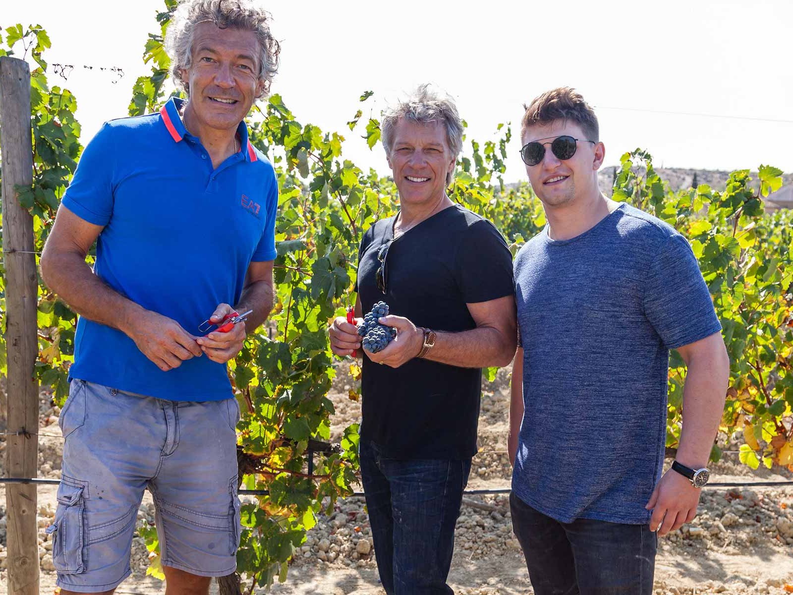Top winemaker Gérard Bertrand with Jon Bon Jovi and his son Jesse Bongiovi.