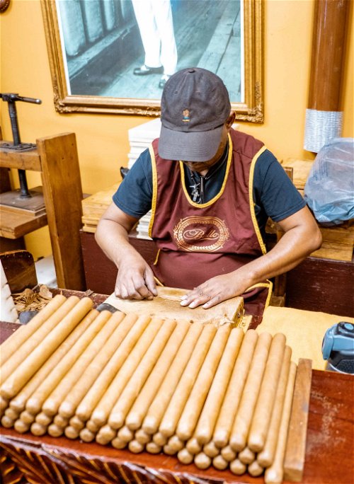 Meanwhile, in Little Havana, the cigars are still rolled by hand.