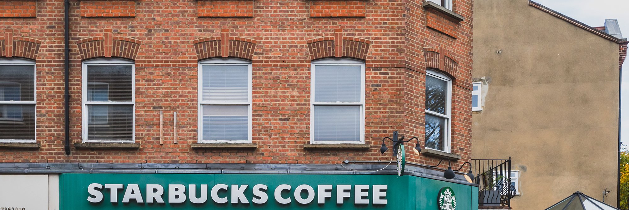 Exterior of Starbucks Coffee shop near Parsons Green in Fulham: Starbucks might sell its UK business.