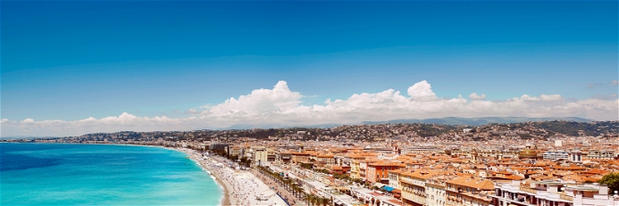 The beach stretches for kilometres under the Promenade des Anglais, where top restaurants and luxury hotels are lined up side by side.