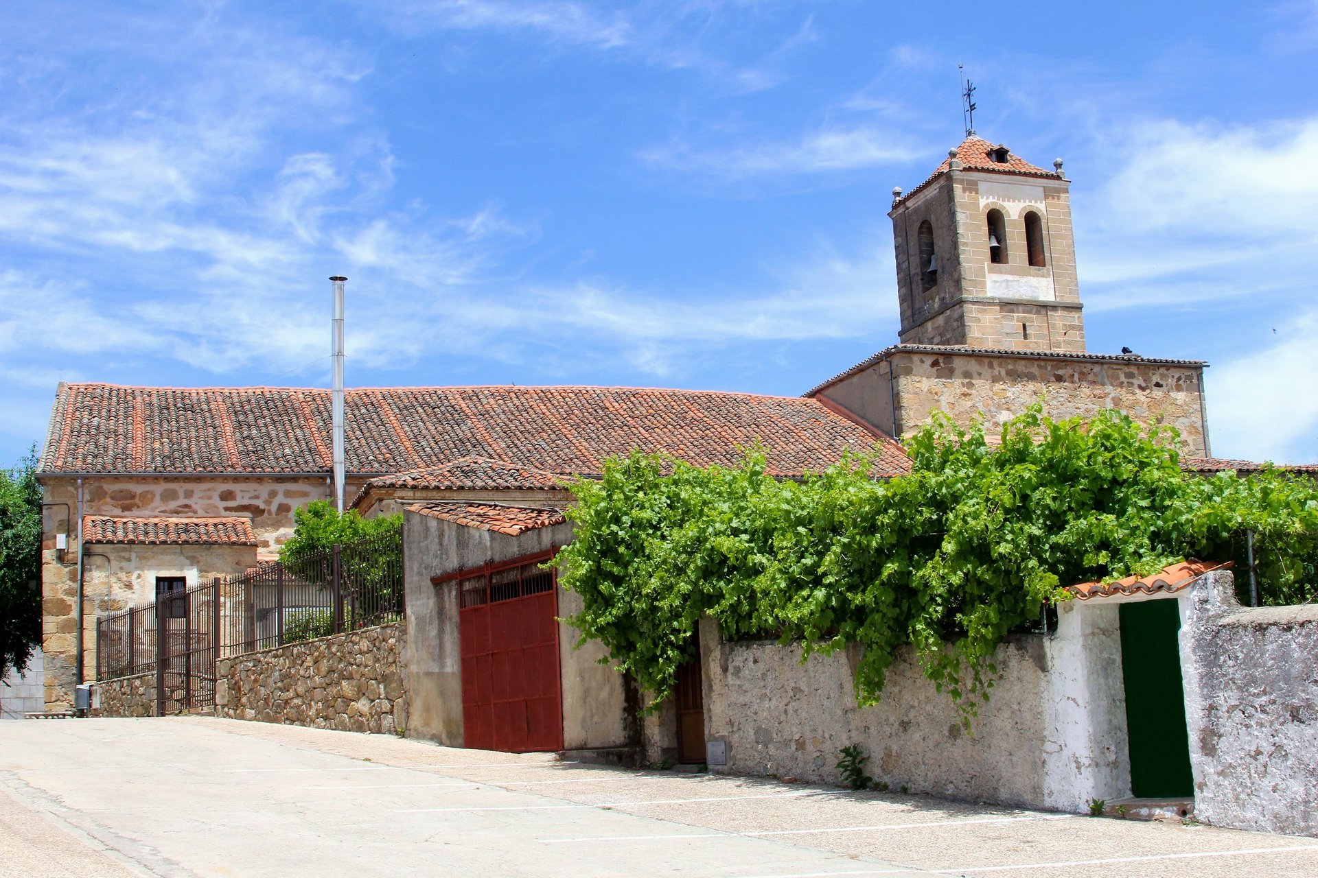 A church and vineyard in village of Candeleda, Sierra de Gredos.