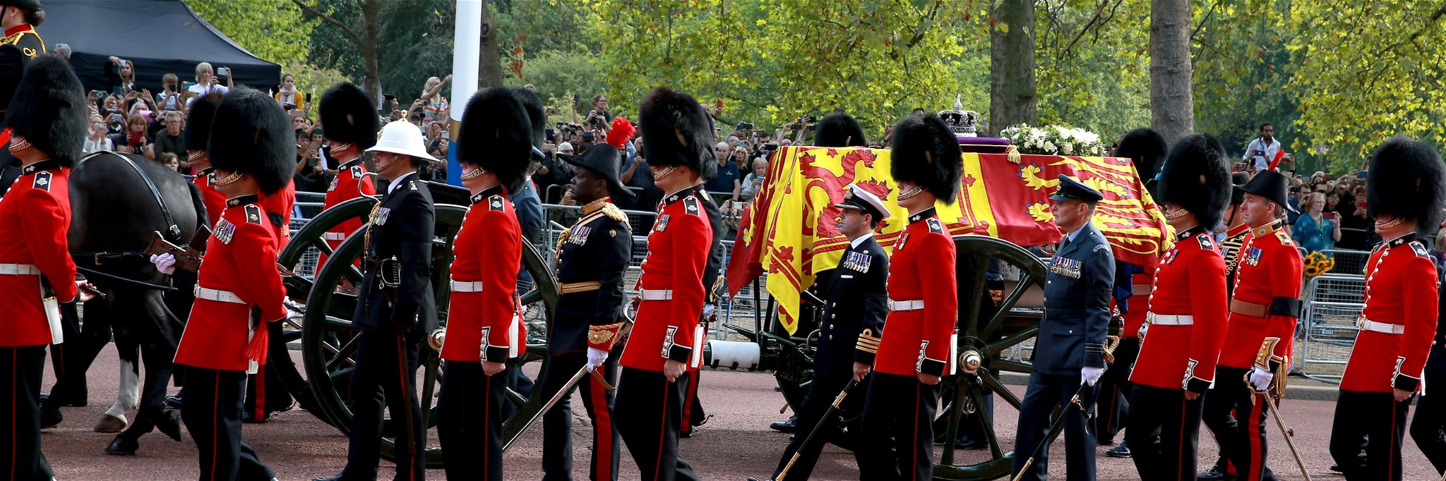 The coffin carrying Queen Elizabeth II makes its way along The Mall.&nbsp;