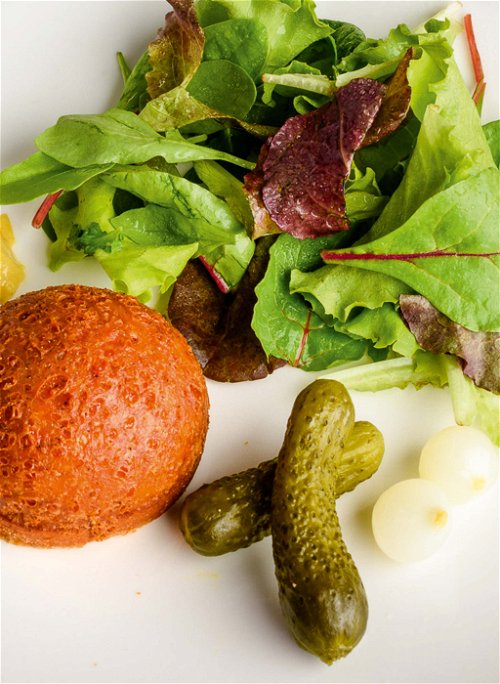The traditional Vaud speciality Malakoff, a&nbsp;deep-fried cheese ball, is served here.