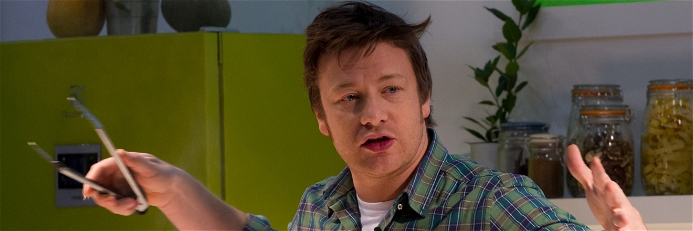 A file shot of Jamie Oliver cooking in 2012.