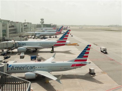 Miami, Florida, USA, August 23 2021, American Airlines planes in line stopped in Miami International Airport boarding area
