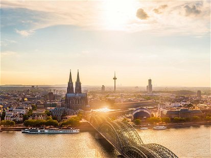 Panorama of Cologne with Cologne Cathedral and the Rhine on a beautiful summer evening