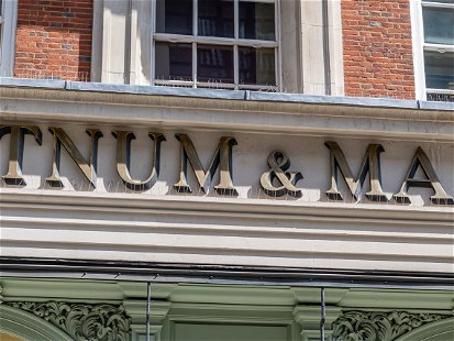 London. UK- 04.09.2023. The name sign on the facade of the famous luxury department store Fortnum and Mason in Piccadilly.