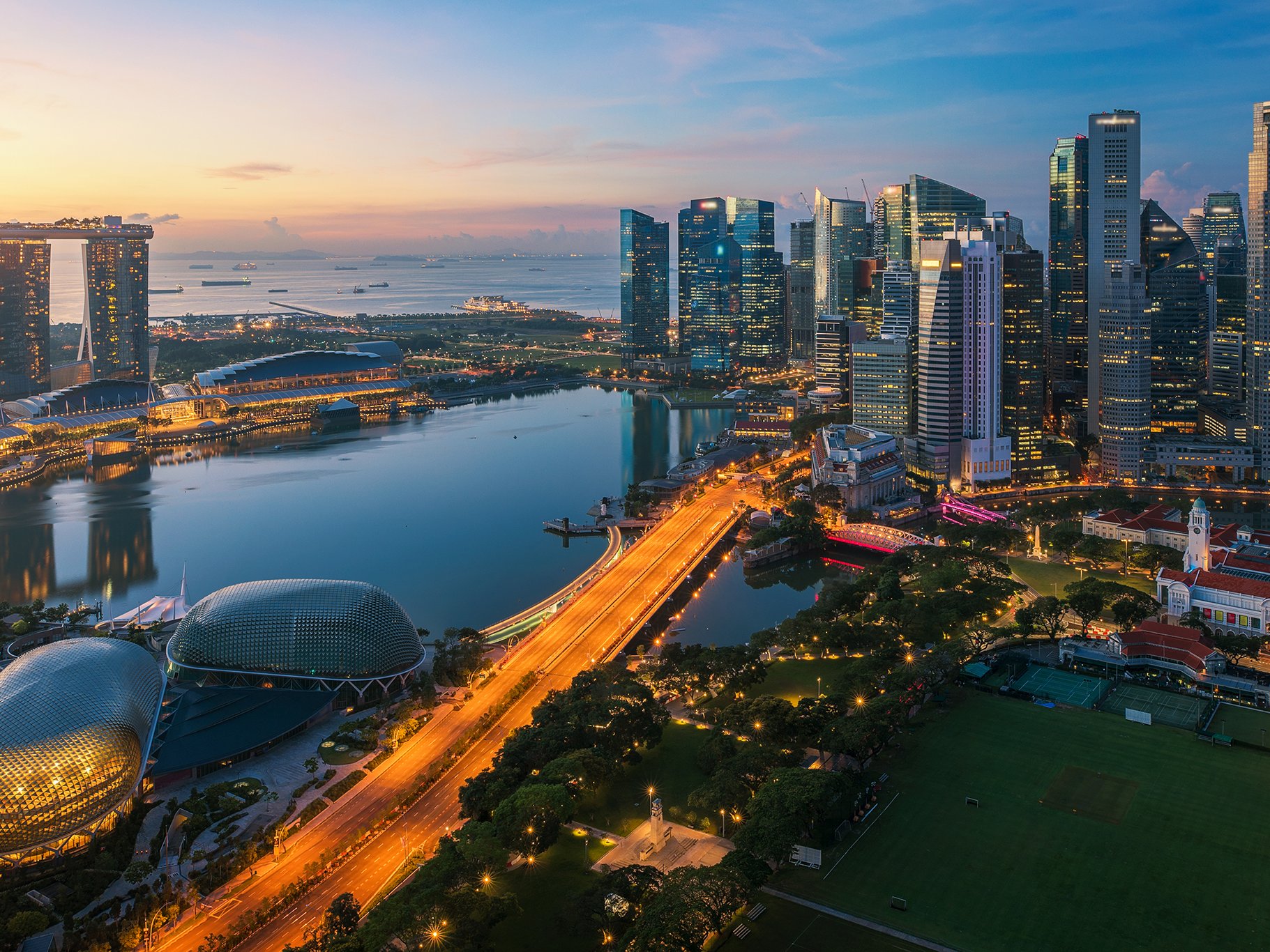 Aerial view of Singapore business district and city at twilight in Singapore, Asia.