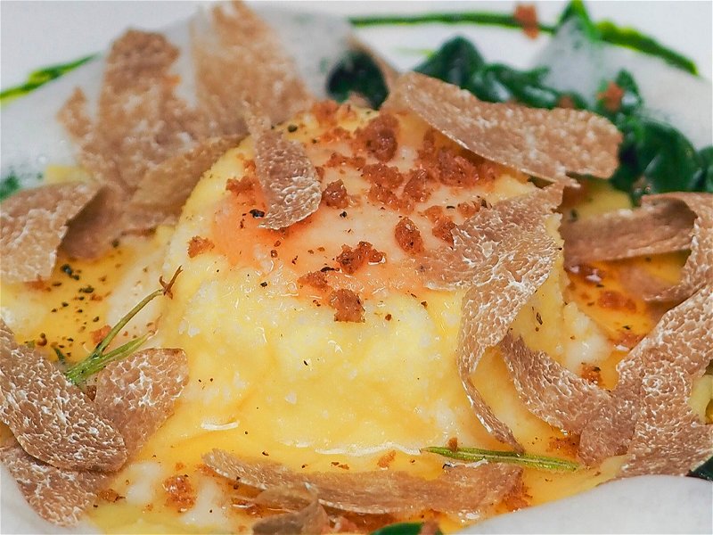 Ricotta ravioli with fresh egg yolk