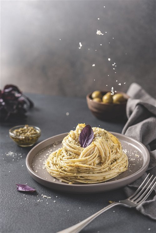 Geriebener Parmigiano Reggiano ist seit Jahrhunderten der perfekte Partner für Pastagerichte.