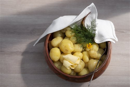 Early potatoes. This is how early potatoes are eaten in the Turku archipelago. Potatoes, dill, butter and nothing else. A suitable drink is Nagu Distillery small patch akvavit. 