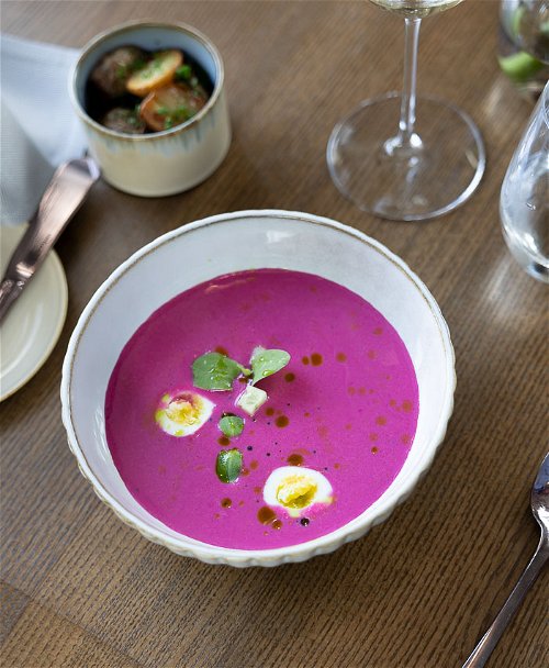 Traditional beetroot soup in restaurant Telegrafas.