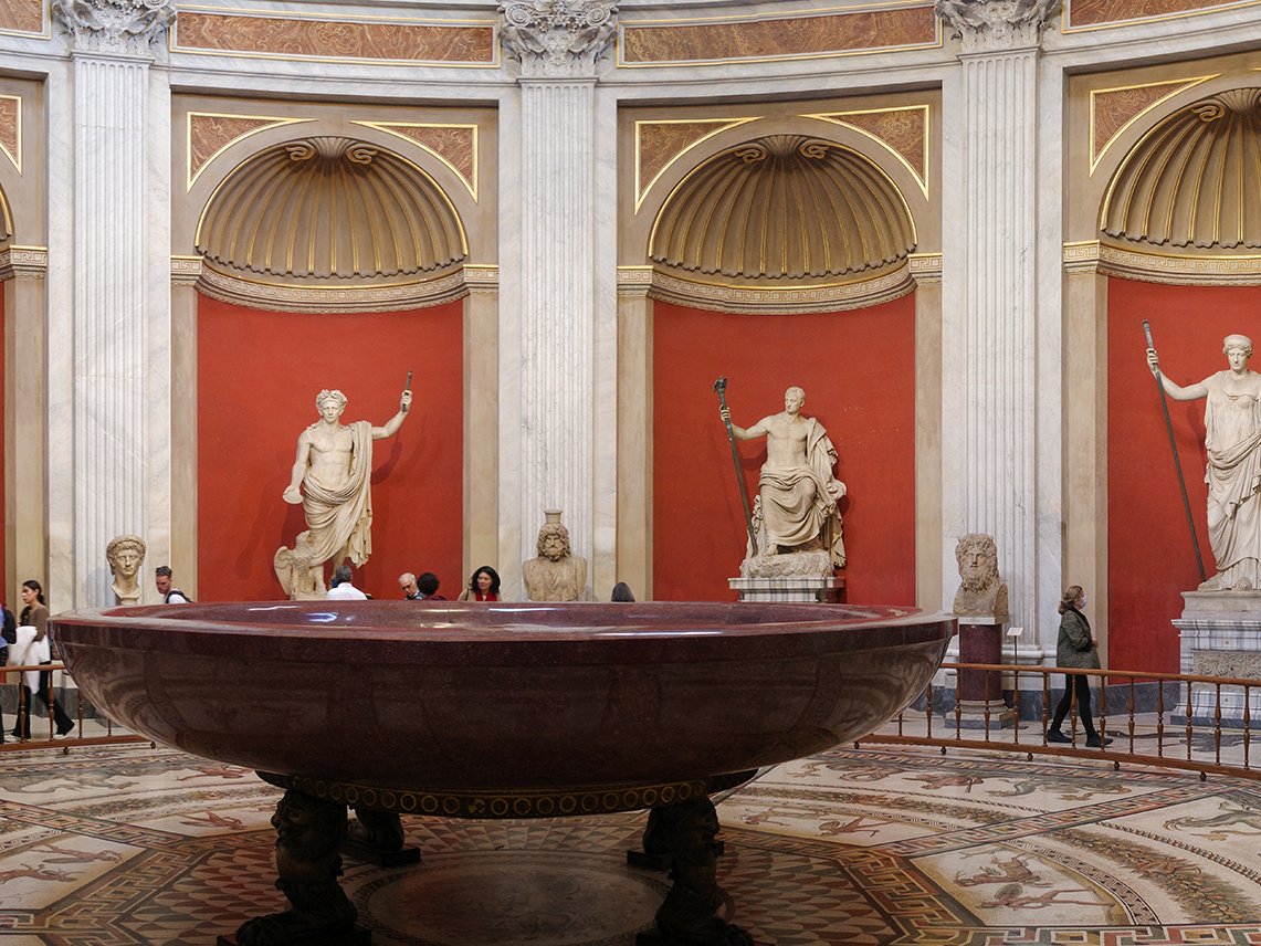 Rome, Italy - 27 Nov 2022: Sculptures and domed celings in The Round Hall, Pio Clementino Museum, Vatican Museums