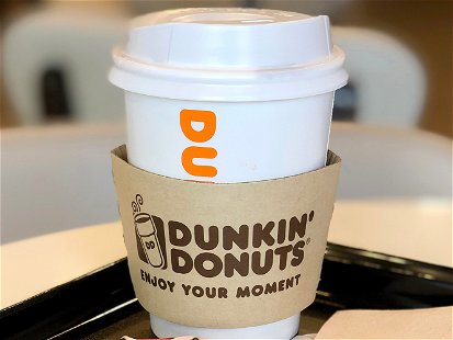 Bangkok Thailand 21 October 2019 : Dunkin Donuts coffee and donut in restaurant. Fast food business background
