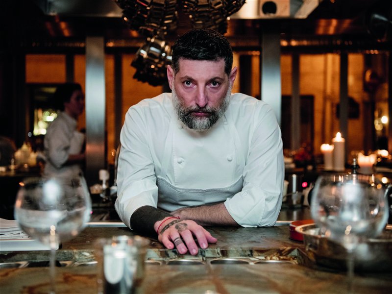 With his muscular, tattooed arms, 45-year-old Assaf Granit doesn't look like a typical star chef.  