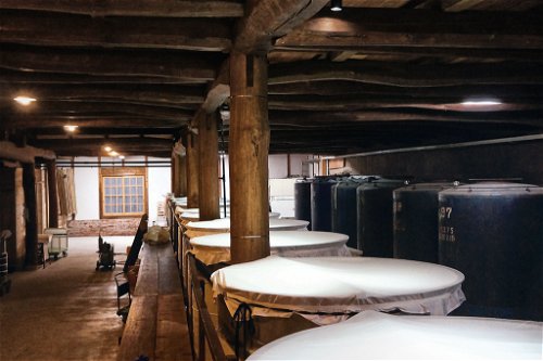 During the fermentation process, which lasts up to 40 days, the mash is stored quietly bubbling in wooden tanks covered with cloth.