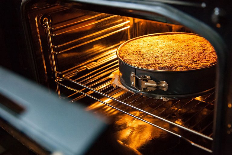 The oven door should remain closed during baking.