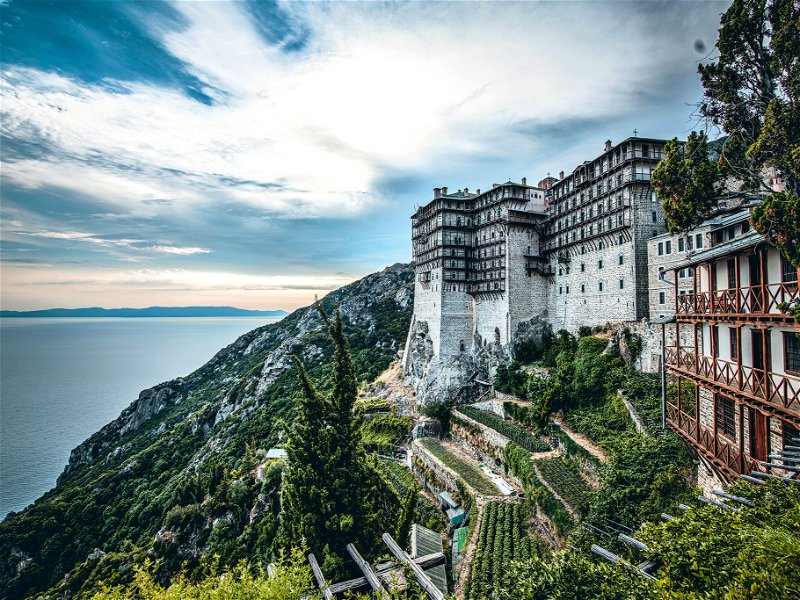 Some of the twenty major monasteries on Mount Athos are true fortresses of faith. The Simonos Petras monastery towers impressively high above the sea.