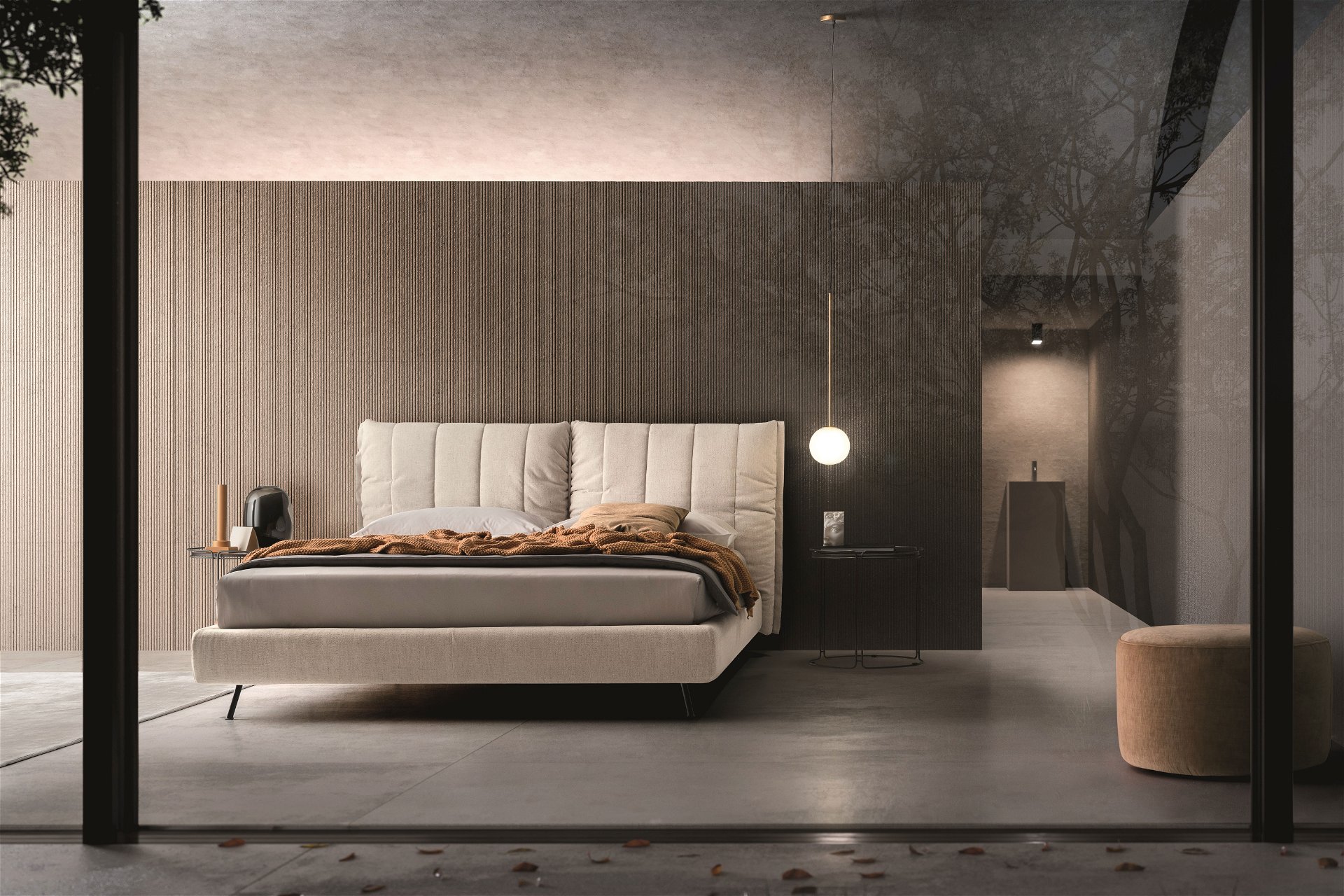 Hygge-Aspekt: Erdige, ruhige Farbtöne und Naturmaterialien liegen im Trend, wie bei diesem Schlafzimmer der Marke Ditre Italia, die lange Erfahrung in der Fertigung von exklusiven Polstermöbeln hat. ditreitalia.com
