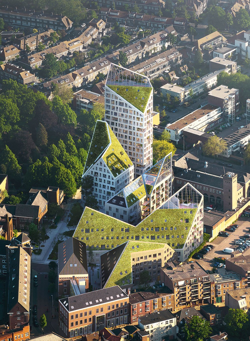 Hollands neue Berge In den eher flachen Niederlanden ist Nieuw Bergen in Eindhoven ein Highlight. Das Projekt umfasst 220 Wohnungen, Geschäfte, begrünte Dächer und sogar Urban Farming mit Blick in den Himmel.