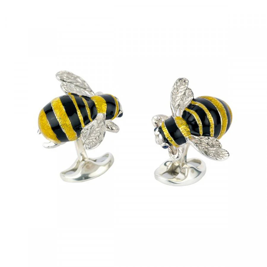 Blickfang: Hummel-Manschettenknöpfe aus Sterlingsilber mit schwarzen und gelben Email-Details und brillantgefassten Cabochon-Saphir-Augen. deakinandfrancis.com